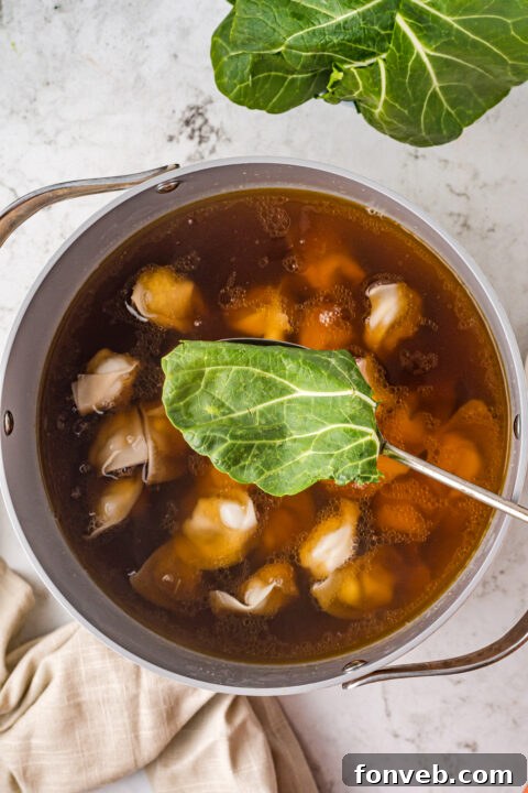 Comforting Wonton Soup 11 Wonton soup served with green onions