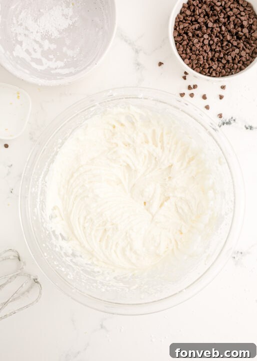 A bowl of confectioner's sugar, ready to sweeten the cannoli dip.