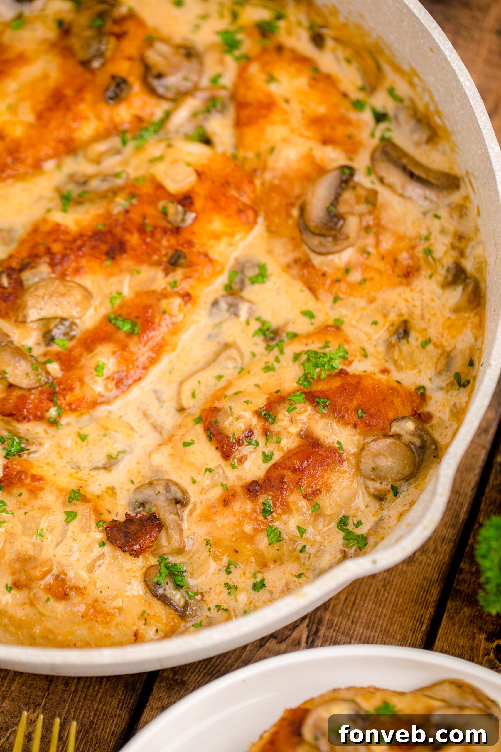 Up close view of Chicken Marsala in a skillet.