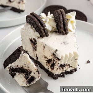 Close up shot of a slice of no-bake Oreo cheesecake.