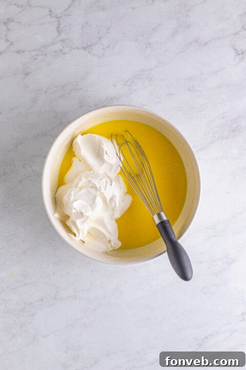 Mini Banana Split Delights 9 Two Banana Split Shots in clear glasses, beautifully layered.