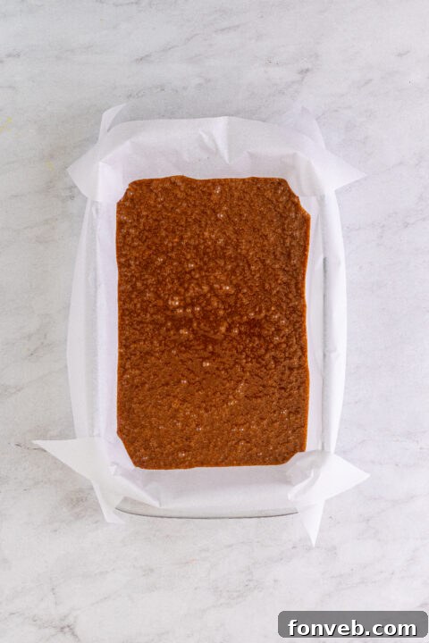 Ingredients for the topping being mixed in a saucepan.