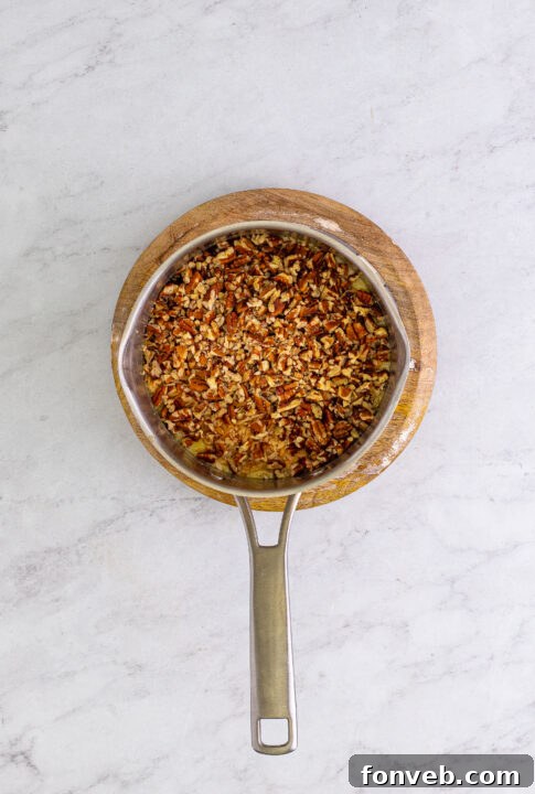 A finished German Chocolate Brownie, garnished with melted chocolate.