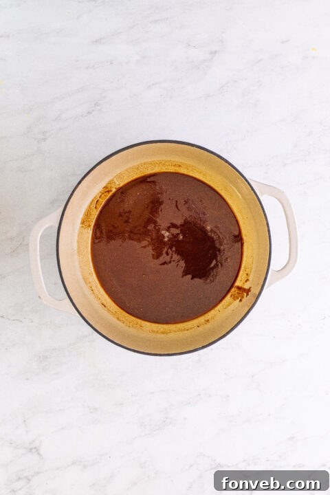 Close-up of a German Chocolate Brownie with a rich topping.