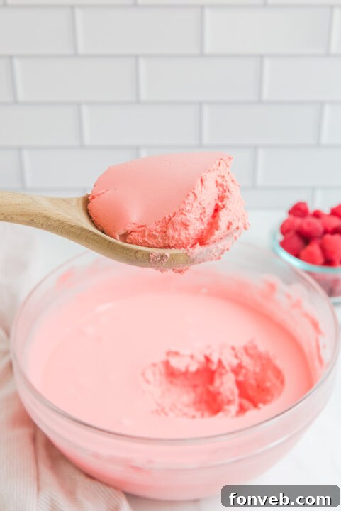 Luscious Raspberry Whip 13 Final Raspberry Jello Fluff mixture before chilling.