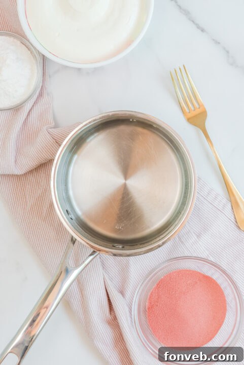 Luscious Raspberry Whip 8 Close-up of a small glass bowl filled with Raspberry Jello Fluff.