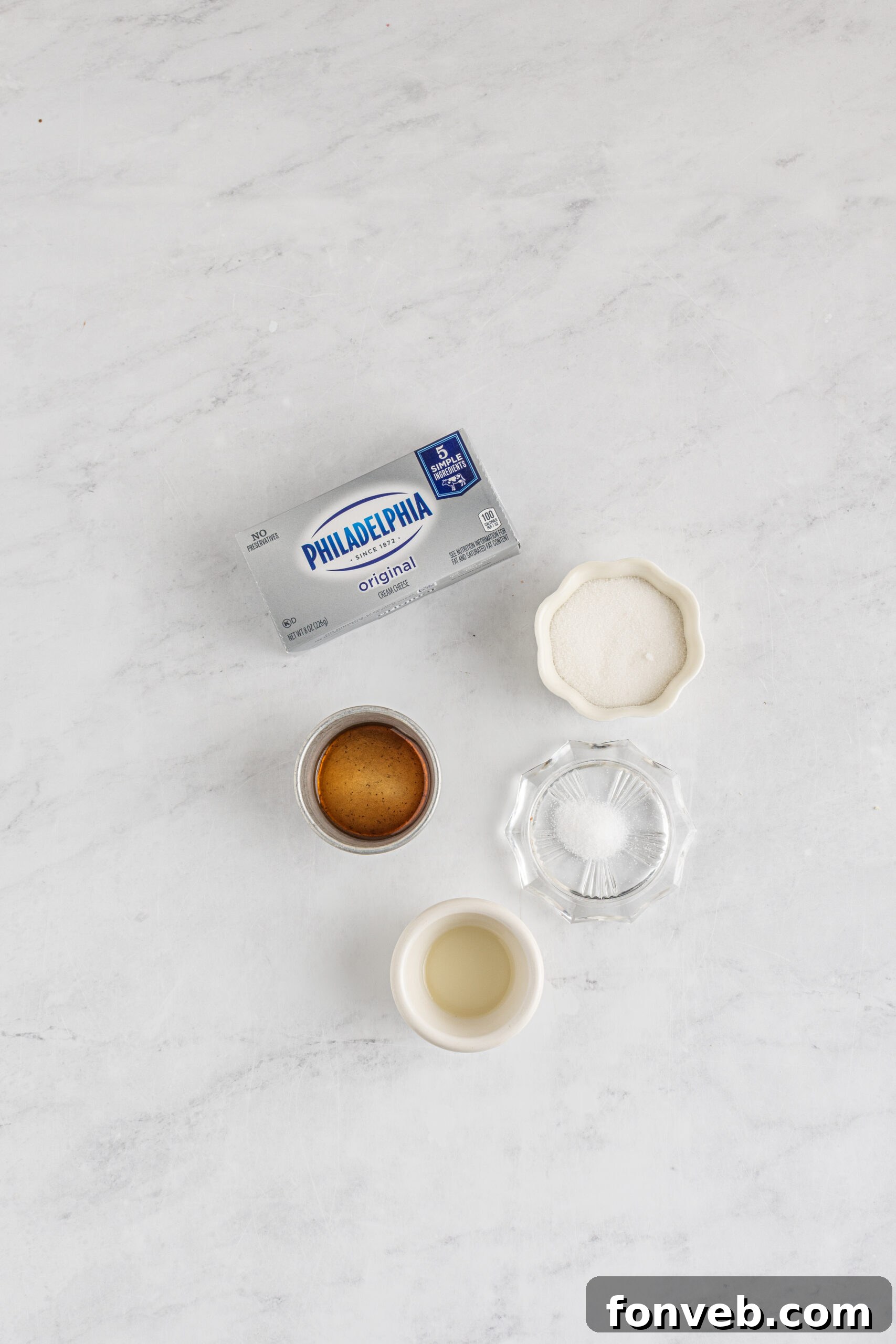 Overhead view of all the fresh ingredients artfully laid out on a clean surface, ready for preparing the Cheesecake Egg Rolls.