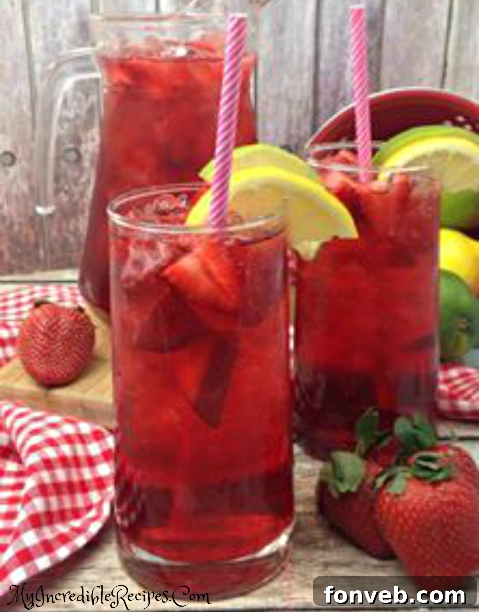 Full pitcher of Southern Strawberry Sweet Tea ready to be served