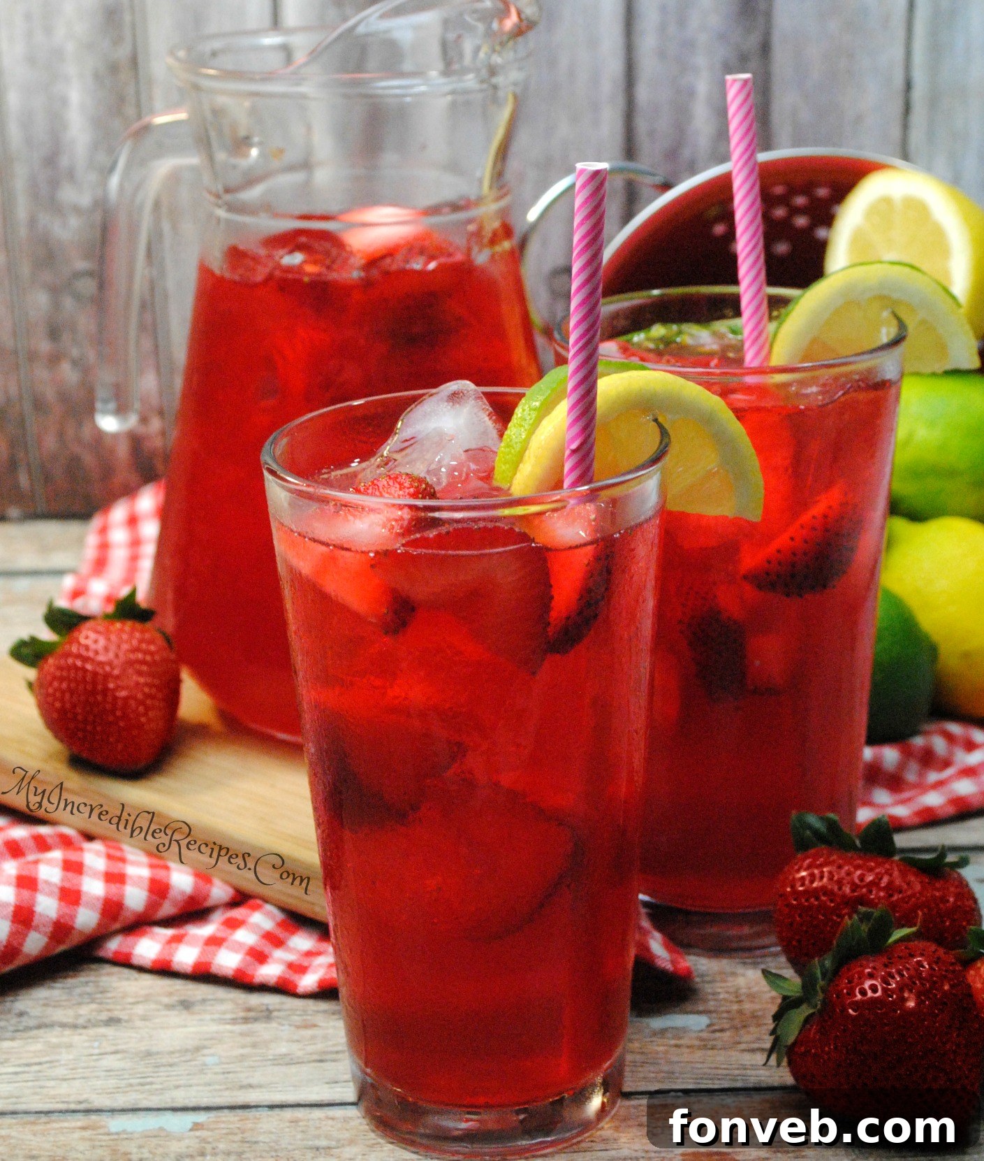 Hands preparing fresh strawberries, hulling and chopping them