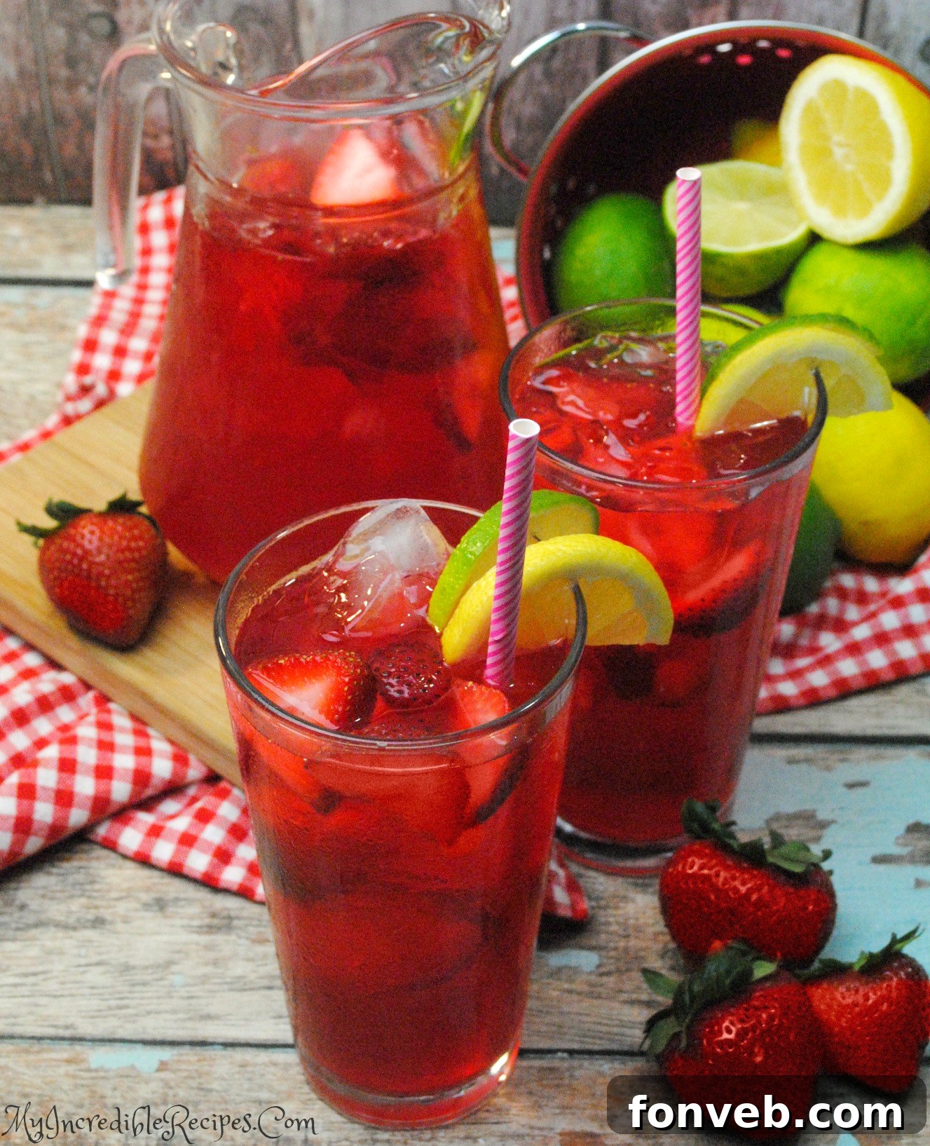 Combining strawberry puree with tea and citrus in a pitcher