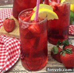 Close-up of strawberry and mint garnish
