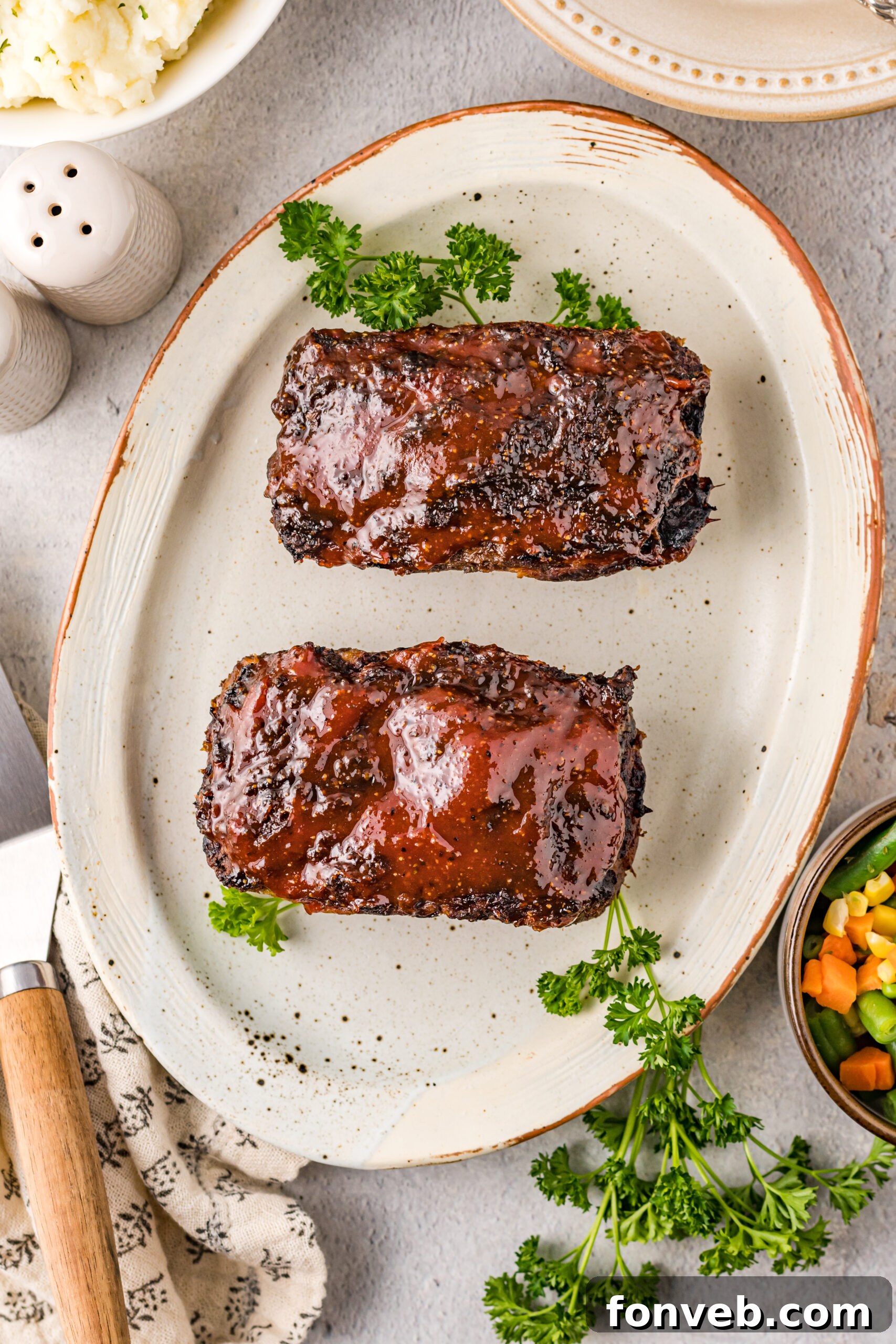 Overhead view of Cracker Barrel Meatloaf on a serving dish.