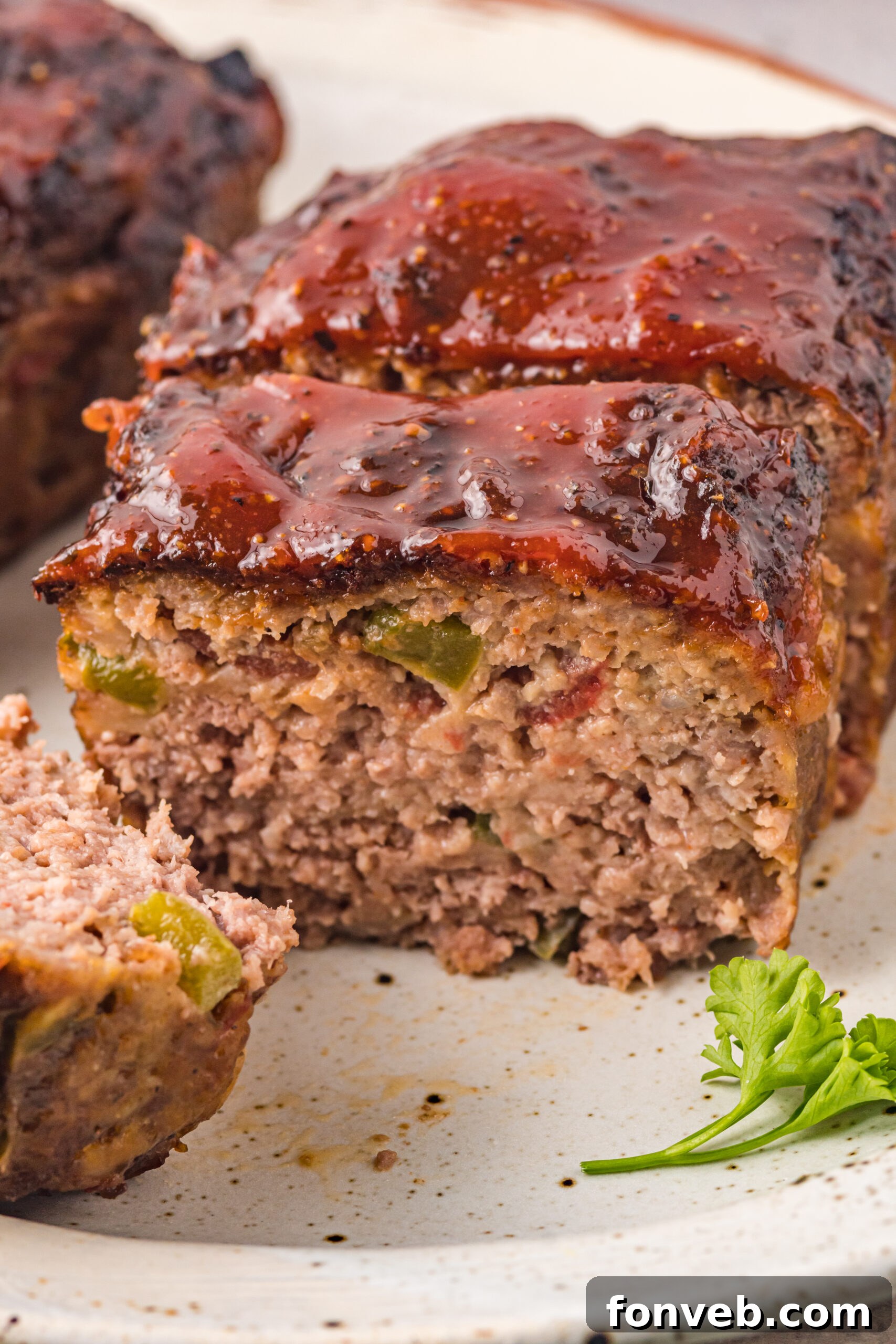Up close view of a slice of Cracker Barrel Meatloaf.