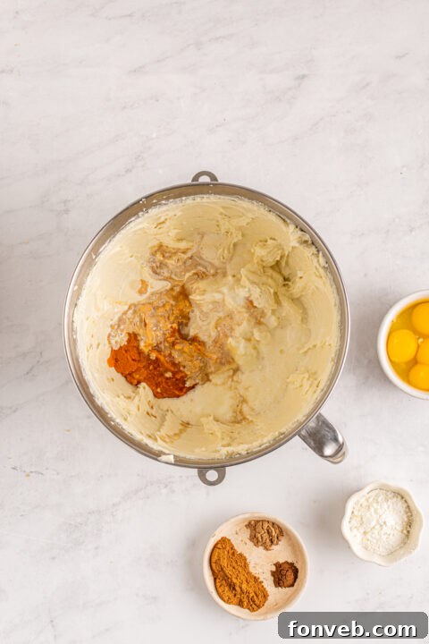 Spiced Fall Cheesecake Bites 12 Mini pumpkin cheesecakes with a delicate swirl on top.
