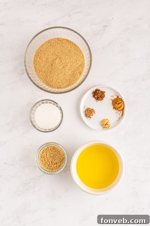 Spiced Fall Cheesecake Bites 7 Two mini pumpkin cheesecakes on a white plate, showcasing their inviting texture.