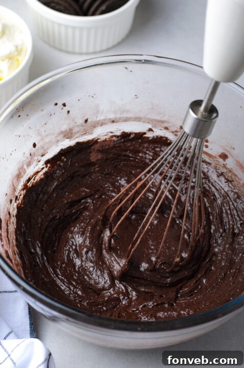 Ruby Red Oreo Cheesecake Gems 11 Mini Red Velvet Oreo Cheesecakes on a cooling rack