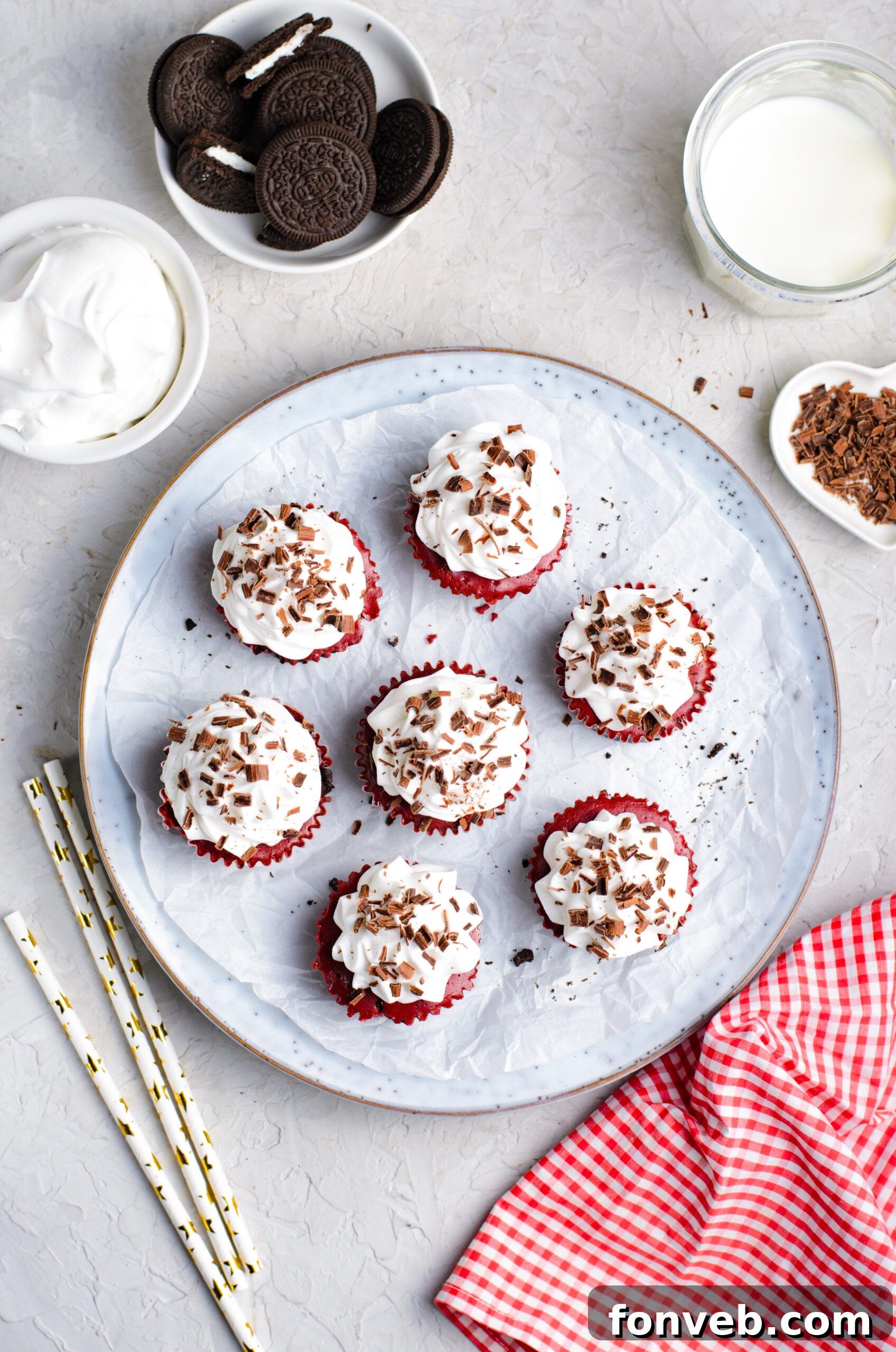 Ruby Red Oreo Cheesecake Gems 3 Overhead view of Mini Red Velvet Oreo Cheesecakes on a dish.