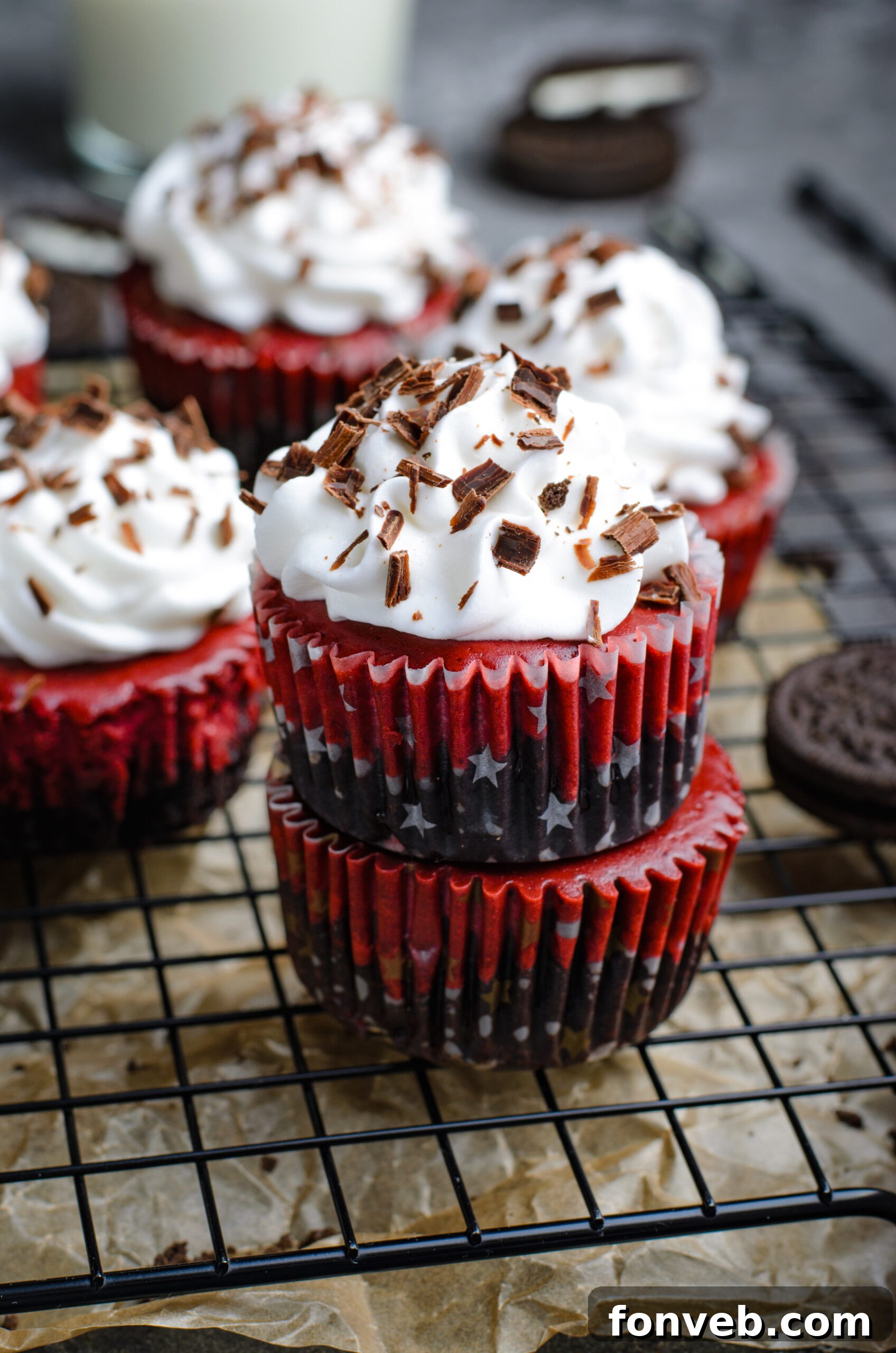 Ruby Red Oreo Cheesecake Gems 8 Front view of three Mini Red Velvet Oreo Cheesecakes stacked.