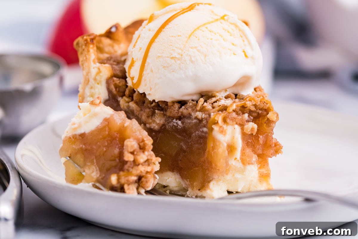 Caramel Apple Crumble Cheesecake Pie 3 Close up view of Apple Crumb Cheesecake Pie