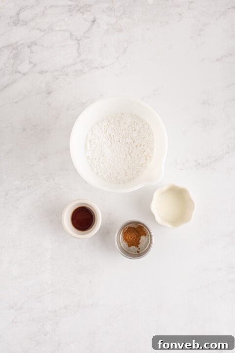 Harvest Pumpkin Bundt with Sweet Cinnamon Finish 9 Cake batter being poured into a greased bundt pan, ready for baking.