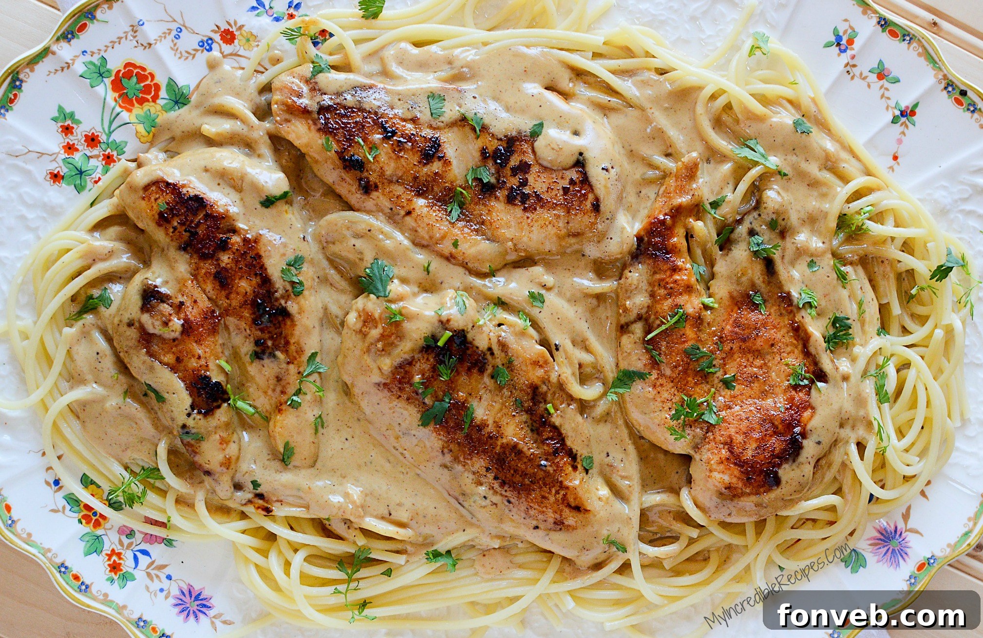 Chicken searing in the pan to seal in flavors