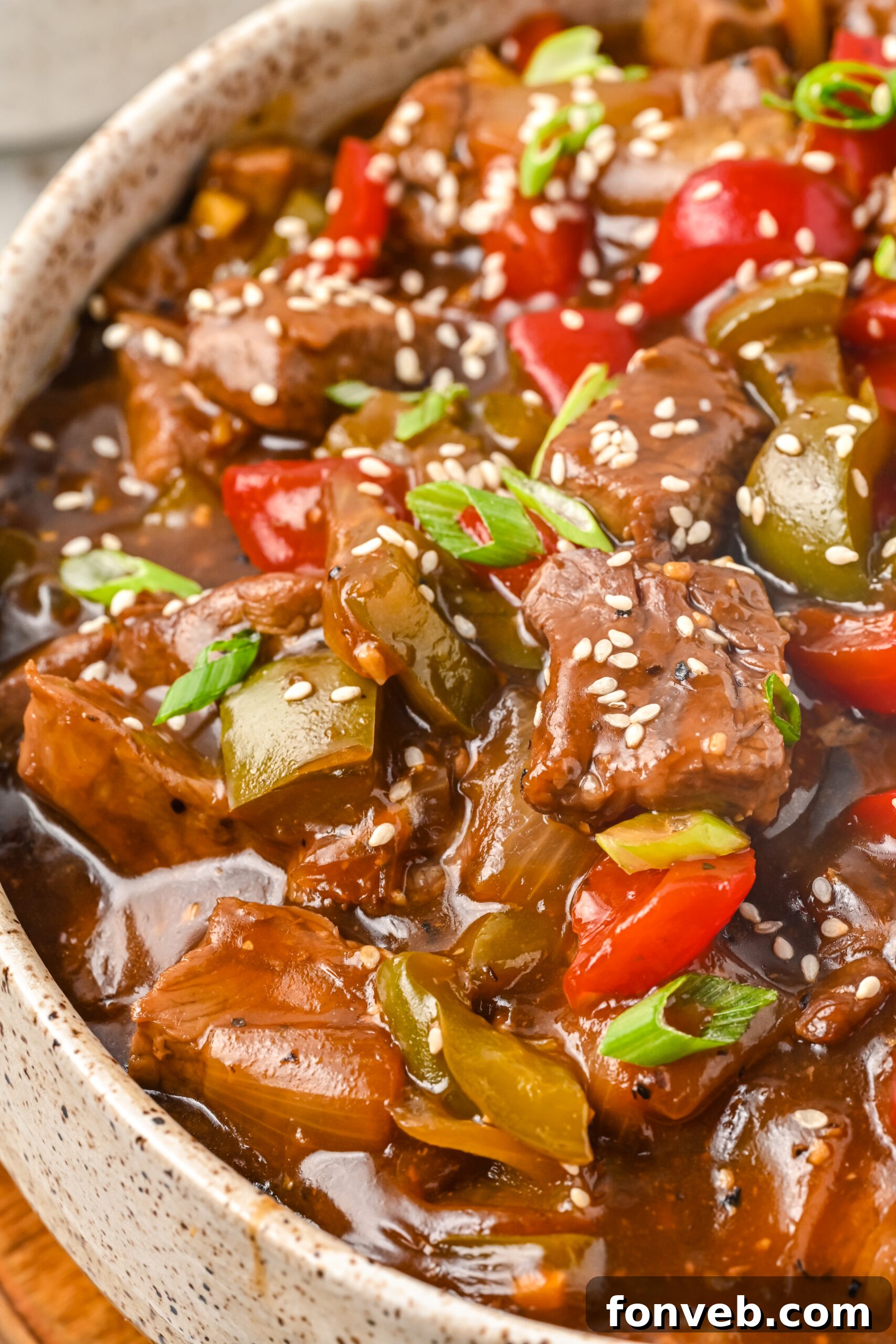 Up close view of Chinese Pepper Steak in a baking dish.