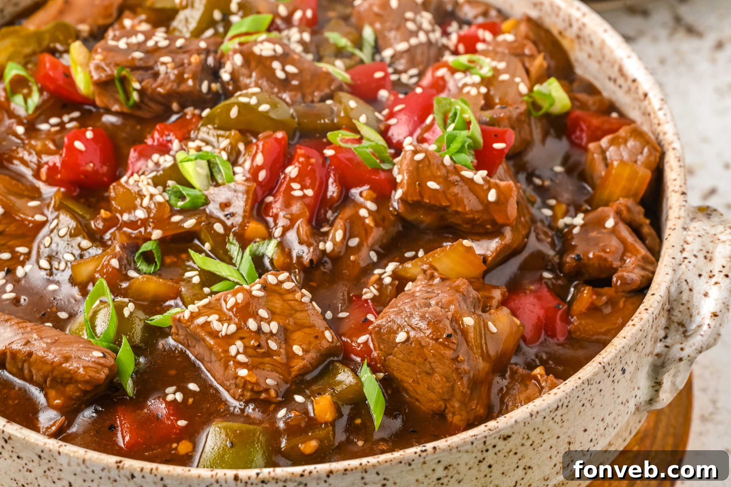 Close up view of Chinese Pepper Steak in a baking dish.