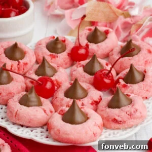 A single Cherry Blossom Cookie with a chocolate kiss on top.