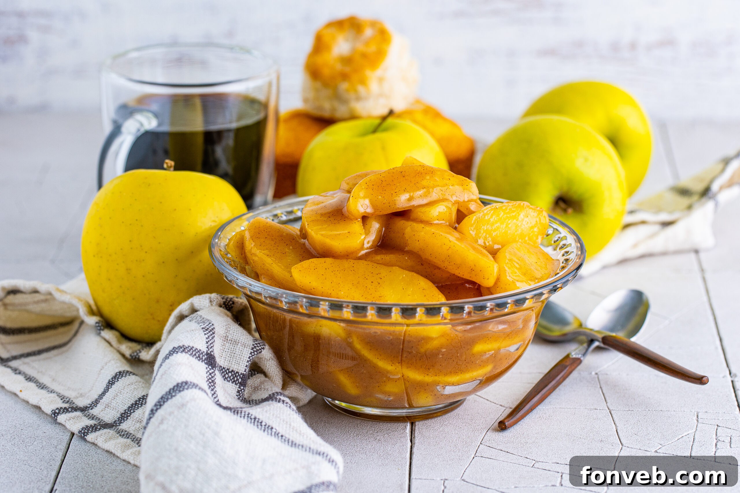 Front view of Cracker Barrel Fried Apples in a clear glass bowl, showing the steamy goodness.