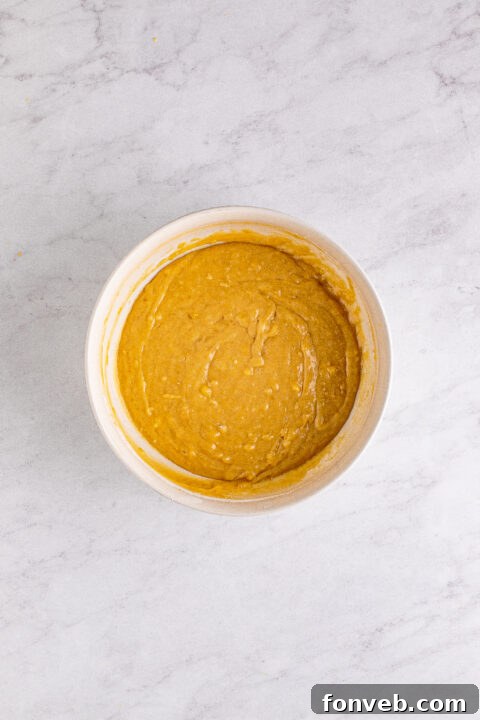 Top-down view of Banana Brownies cooling on parchment paper.