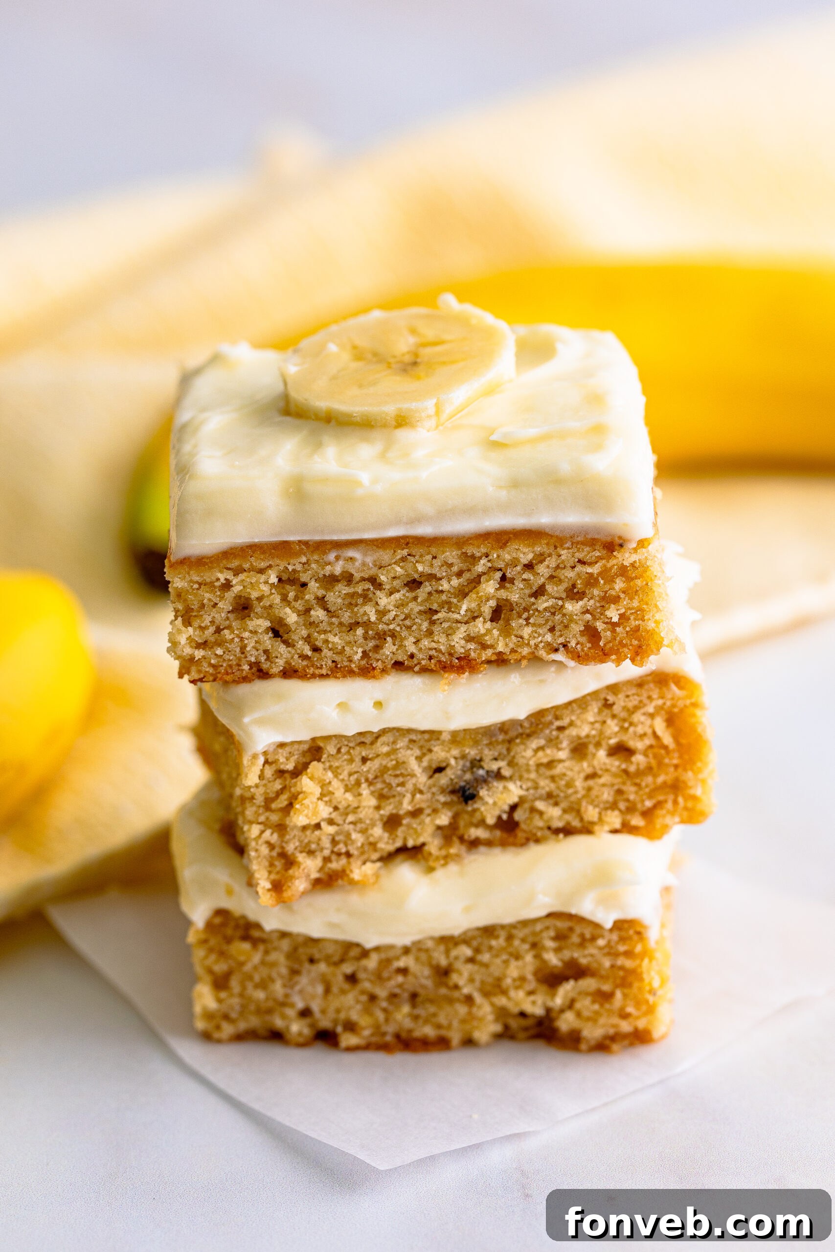 Front view of three Banana Brownies stacked, suggesting their delicious stackability.