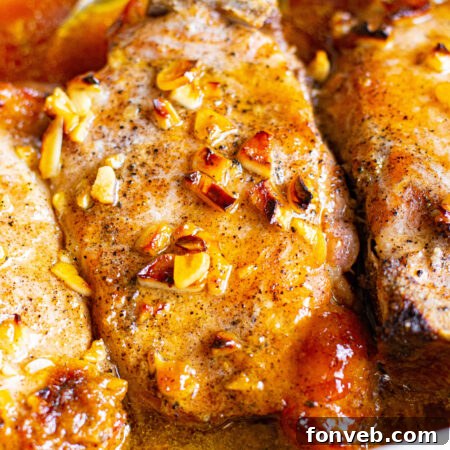 Crispy-edged, juicy Honey Garlic Pork Chops straight from the oven.