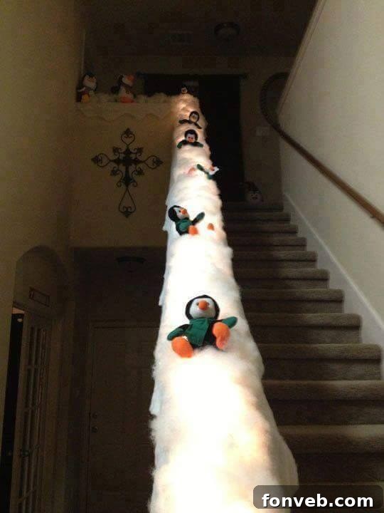 Snow sliding penguins decoration for stairs during Christmas