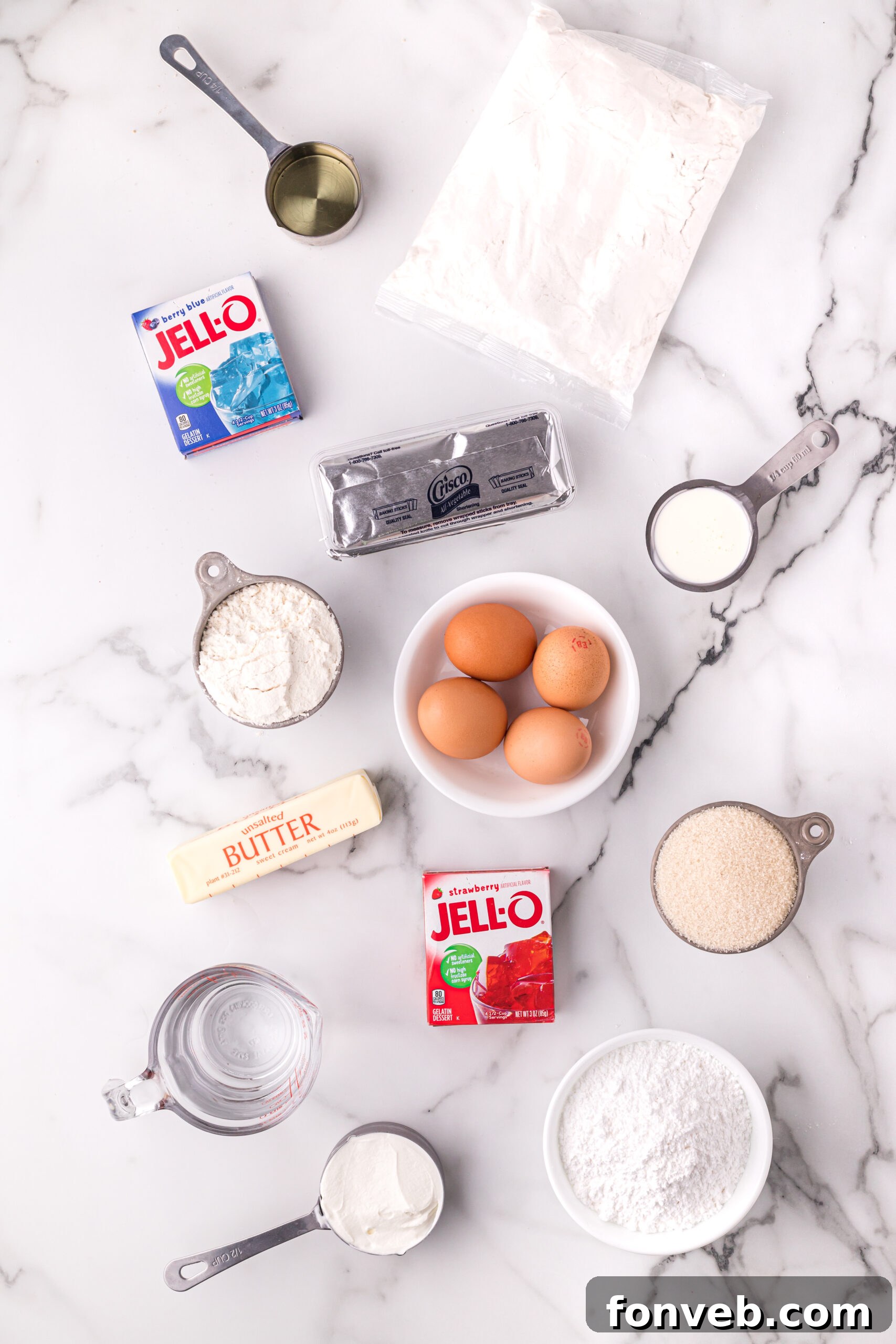 Overhead view of all the measured ingredients neatly laid out, ready for baking this 4th of July cake.