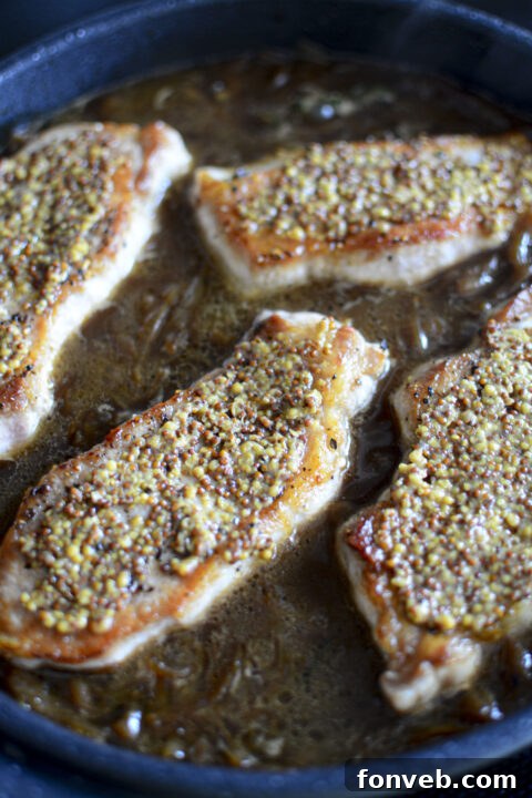 Step-by-step image of cheese being placed on pork chops.