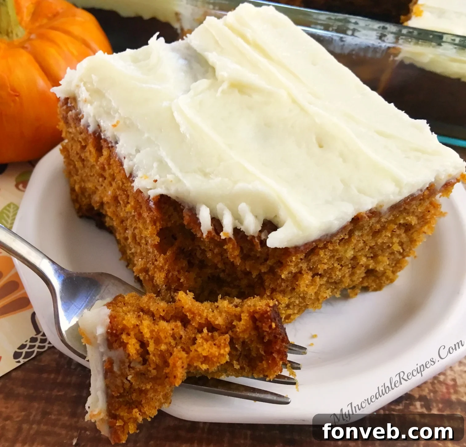 Luscious Pumpkin Spice Cake with Velvety Cream Cheese Frosting 2 Moist pumpkin cake with cream cheese frosting, perfect for Fall