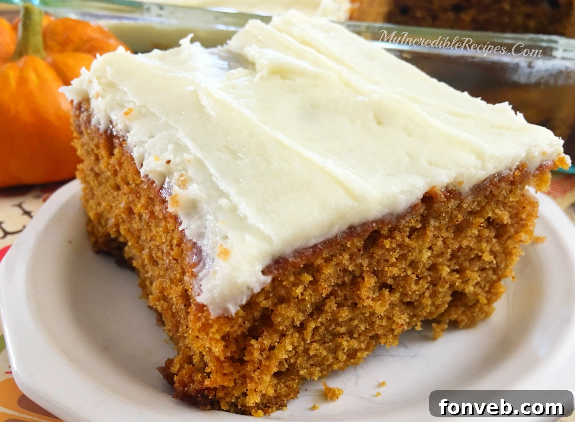 Luscious Pumpkin Spice Cake with Velvety Cream Cheese Frosting 5 Homemade cream cheese frosting generously spread on pumpkin cake