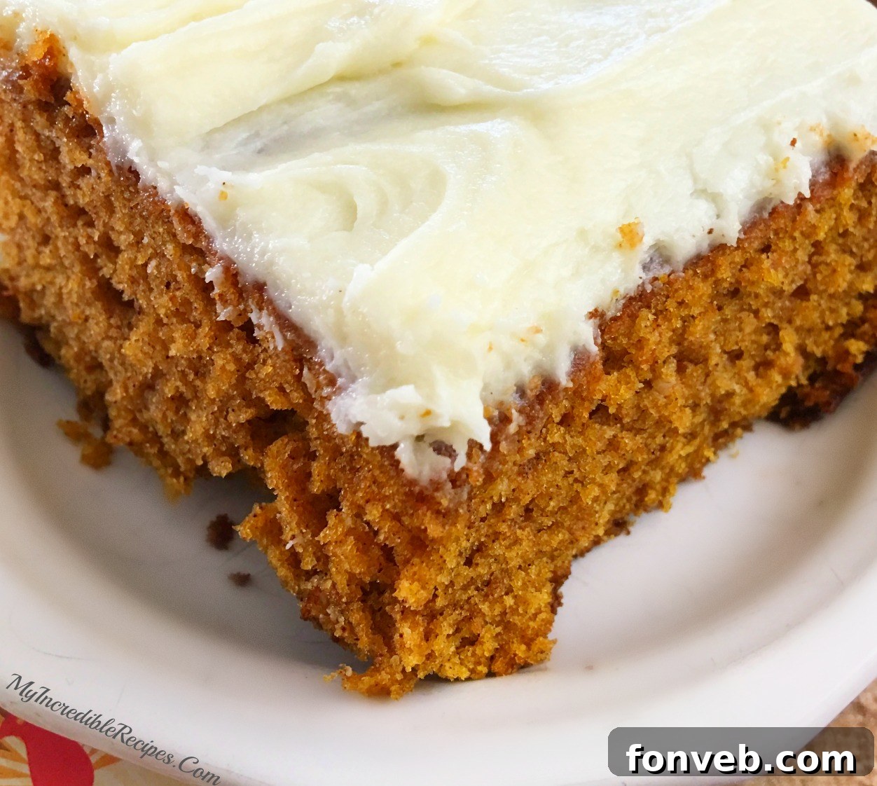 Luscious Pumpkin Spice Cake with Velvety Cream Cheese Frosting 9 Closer look at the individual portions of pumpkin cake and frosting