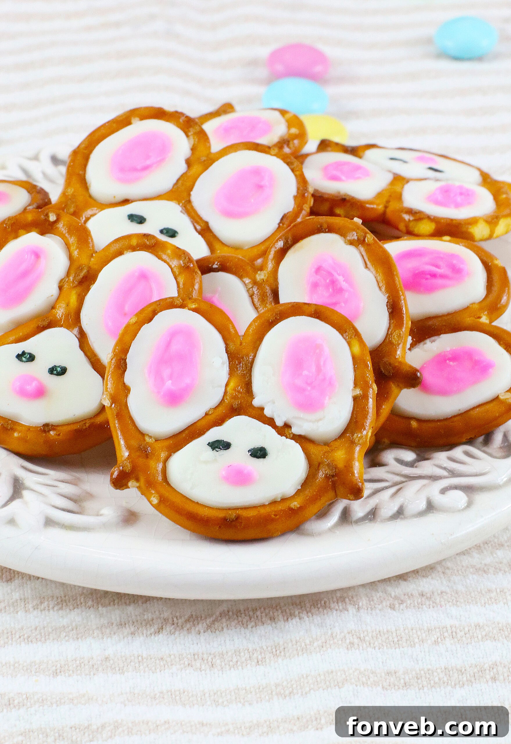 Hoppy Twists 2 A beautifully arranged pile of Easter Bunny Pretzels on a crisp white dish, ready to be enjoyed.