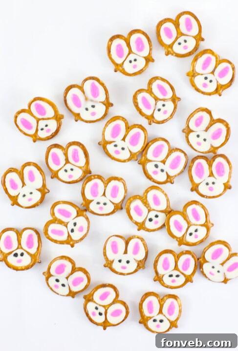 Hoppy Twists 9 A hand gently holding a finished Bunny Pretzel, highlighting its size and intricate detail against a soft background.