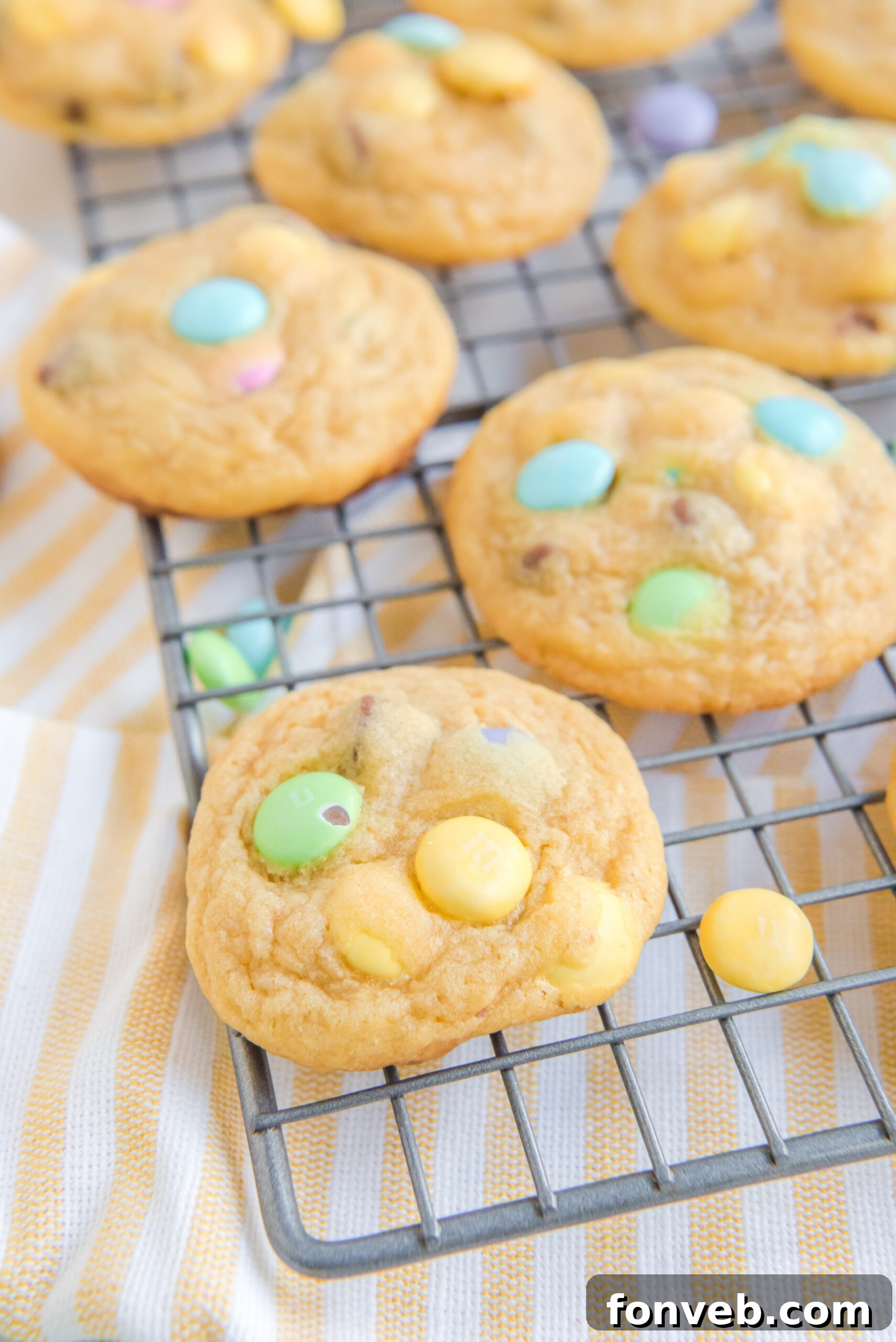 Close up view of several Easter Pudding Cookies arranged artfully on a wire rack.