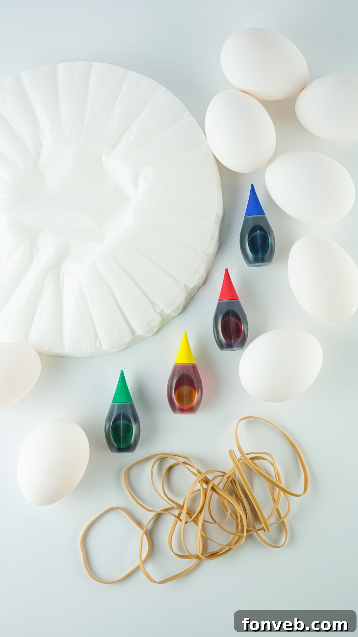 Overhead view of the items needed to make Tie Dye Easter Eggs.