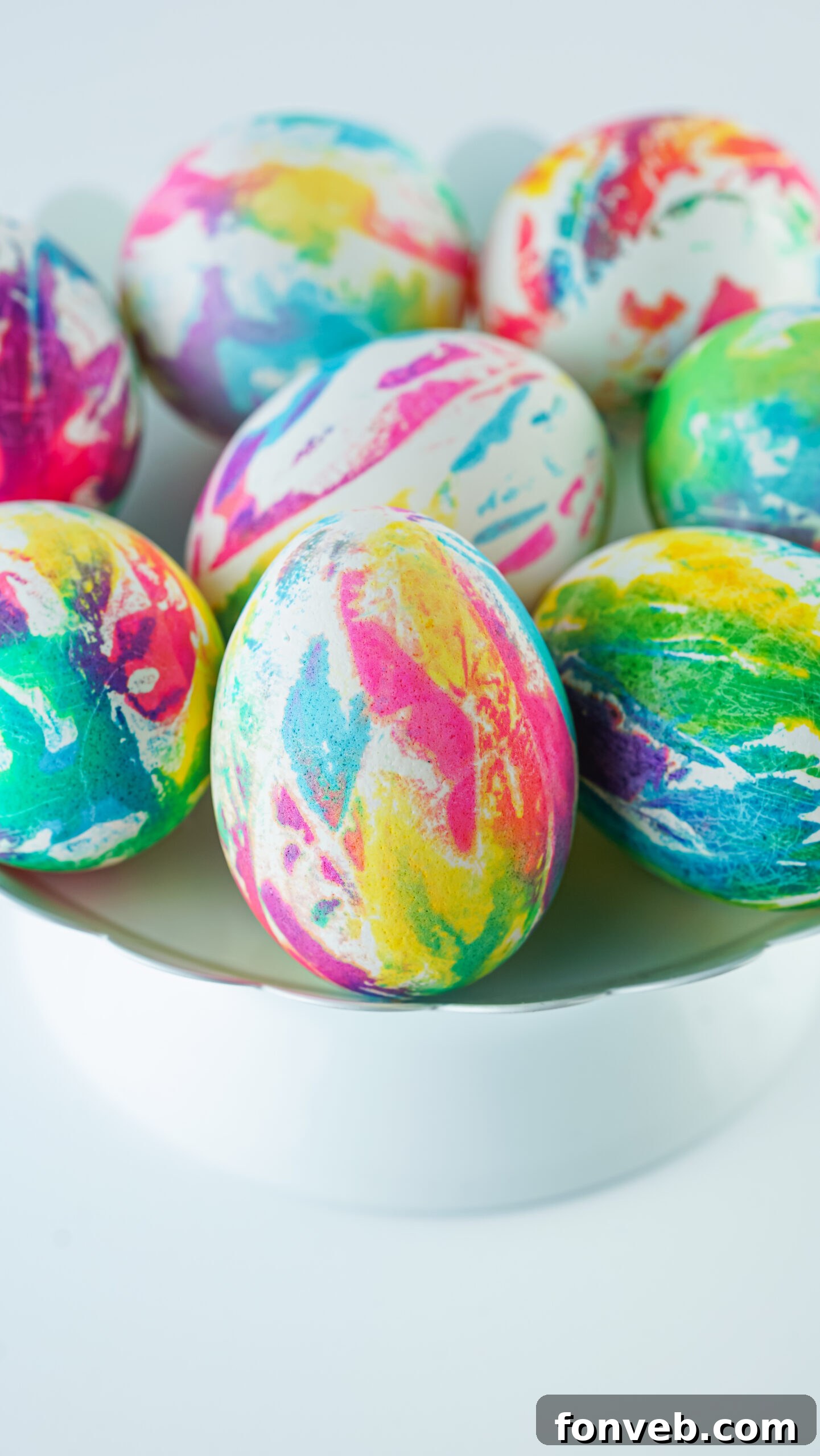 Front view of Tie Dye Easter Eggs on a white stand.