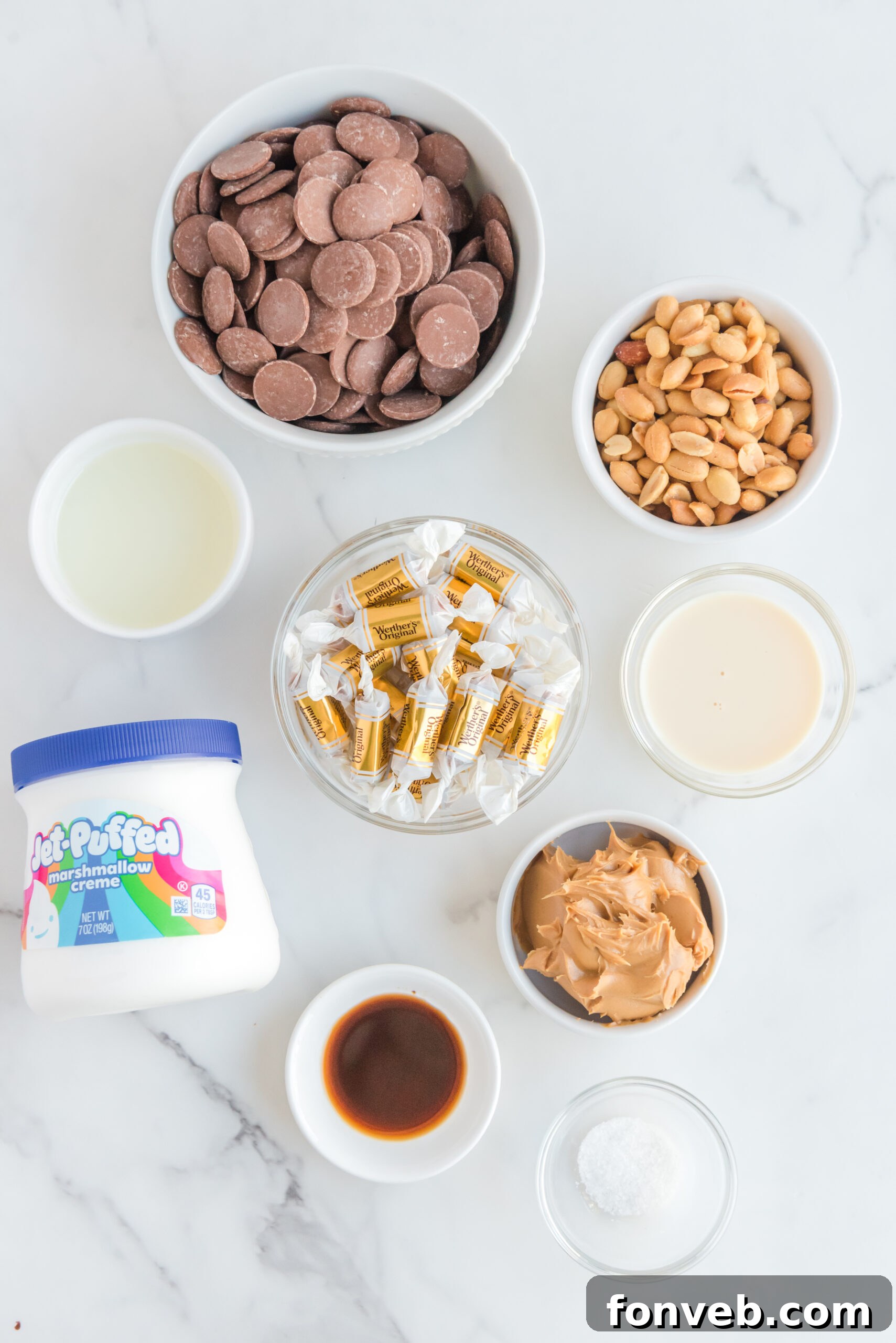 Overhead view displaying all the essential ingredients for crafting Homemade Snickers Bars, neatly arranged for preparation.