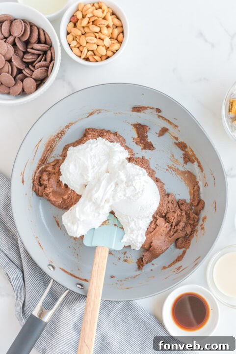 Close-up of evaporated milk in a bowl, highlighting its creamy consistency.