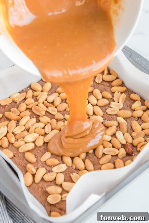 Close-up of creamy peanut butter, showcasing its smooth texture.