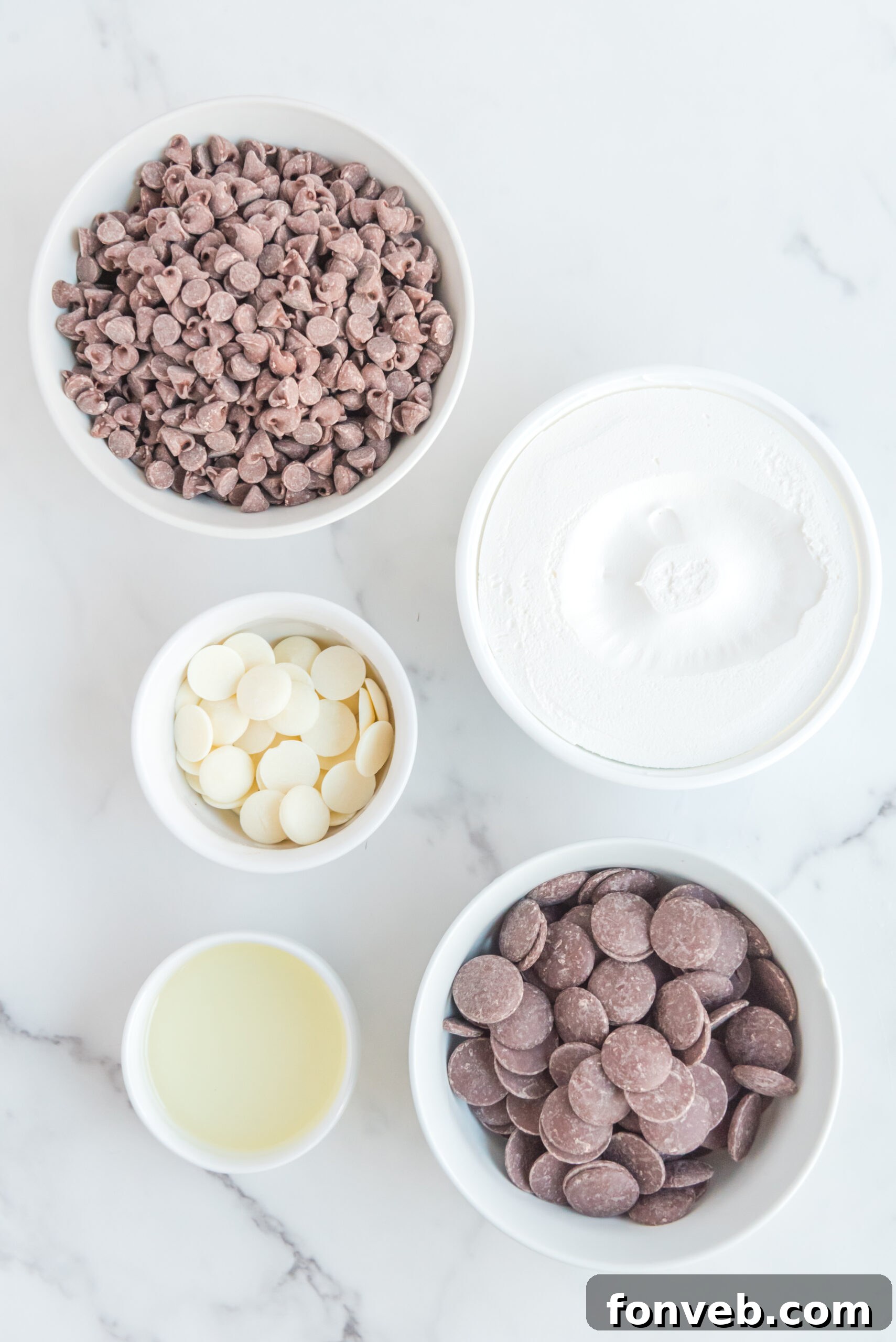 Sweet Cloud Candies 7 An overhead shot displaying all the carefully measured ingredients laid out for the Cool Whip Candy recipe, ready for preparation.