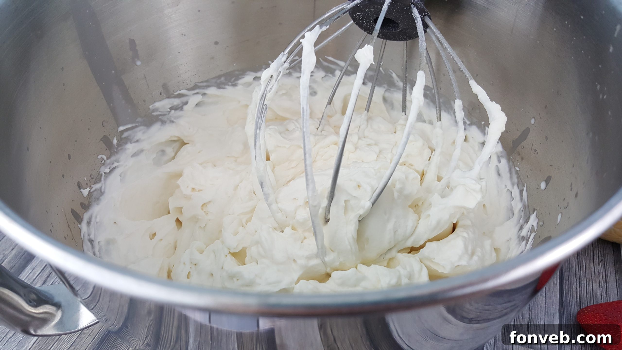 Close-up of creamy White Russian frosting being prepared