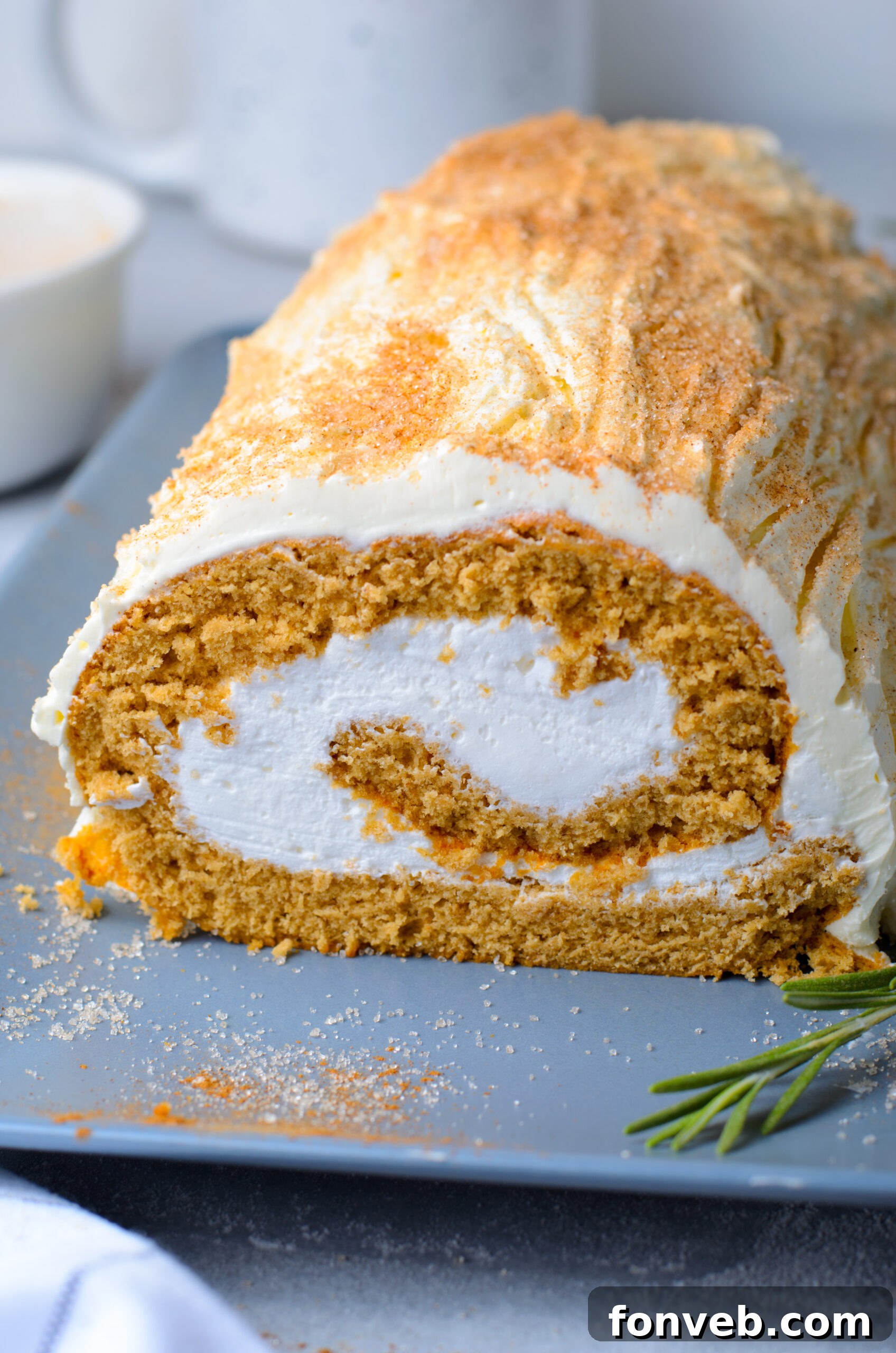 Front view of GIngerbread Cake Roll on a serving tray.