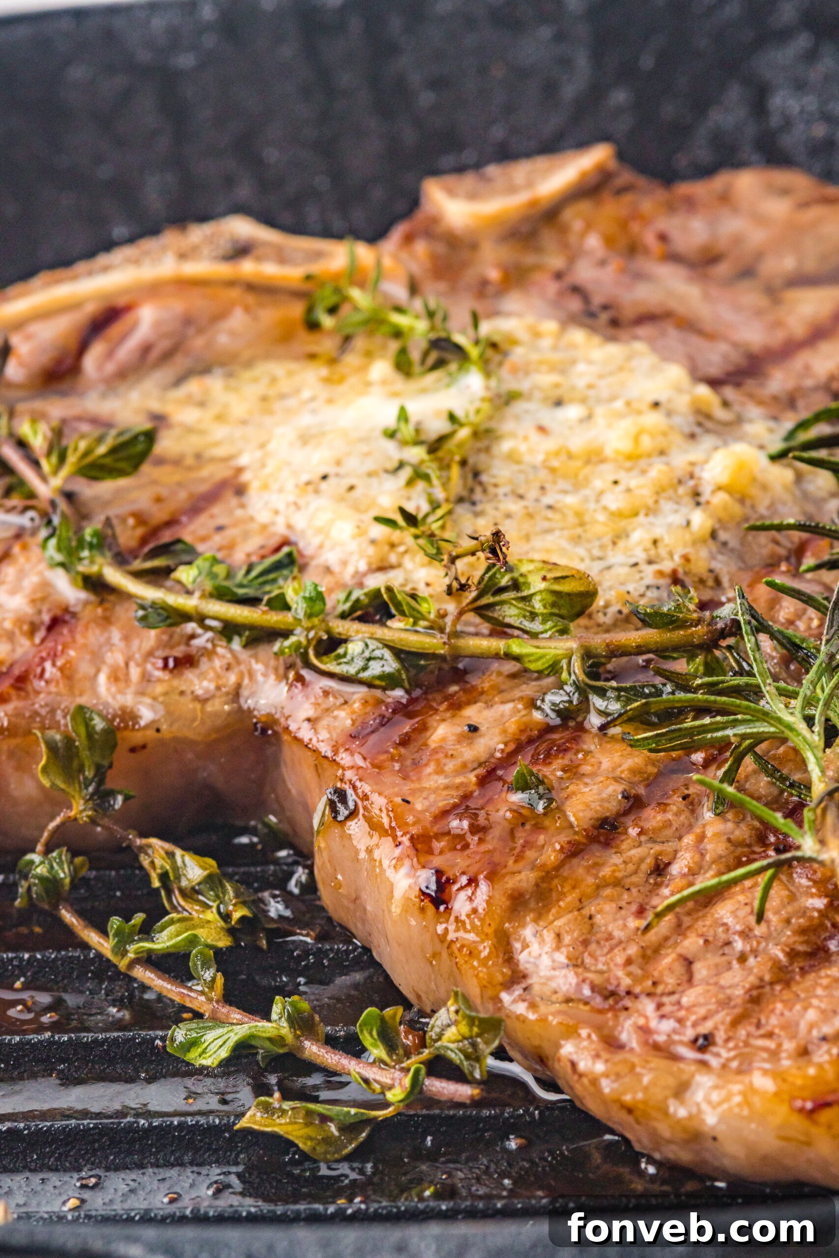 T bone steak cooking in a grill pan
